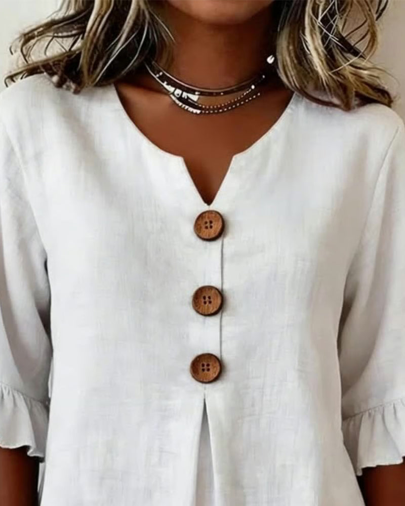 Rolvene blouse wooden button detail