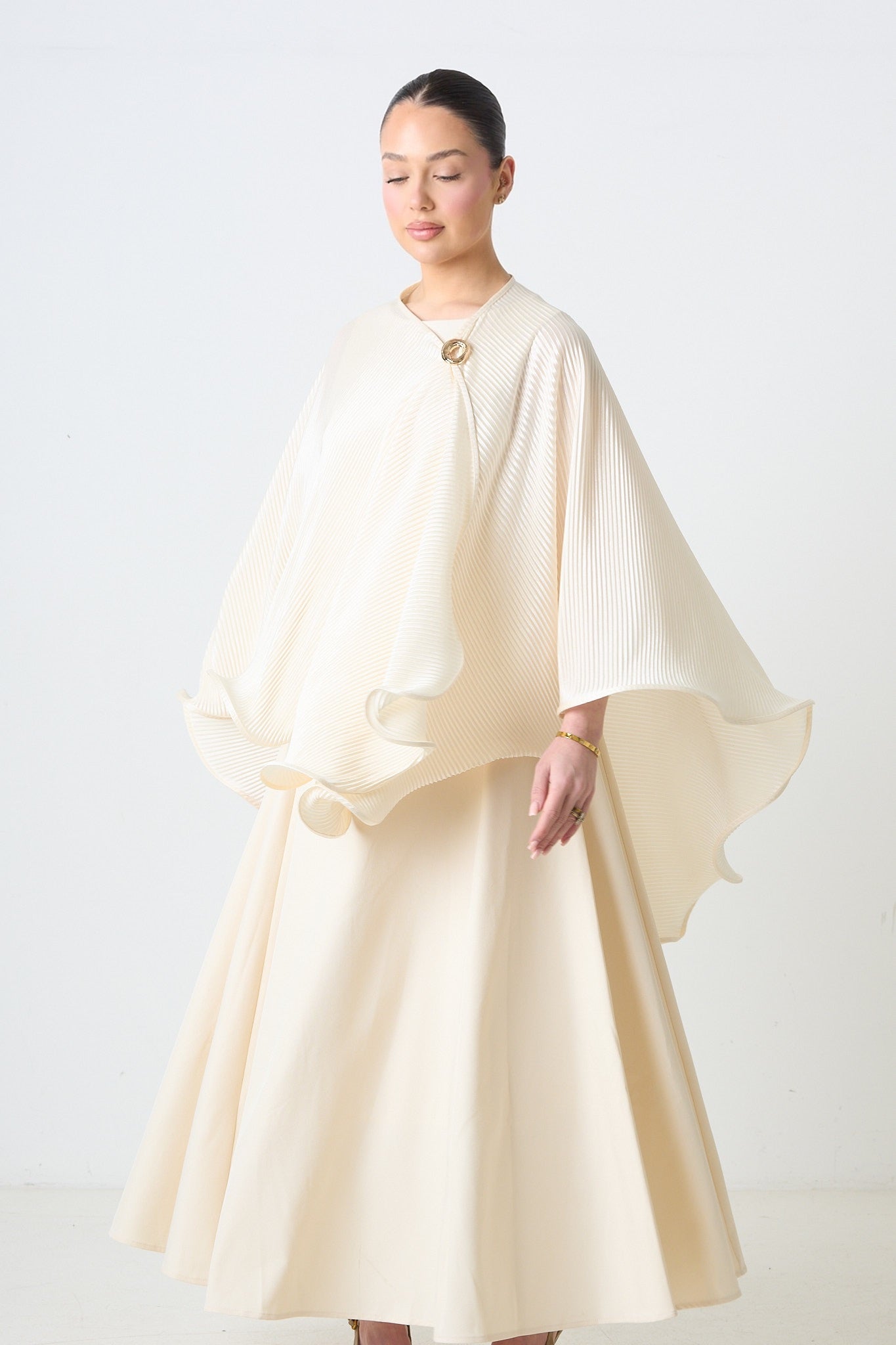 Orbane ruffle poncho side