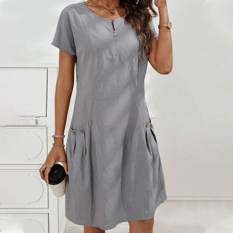 Talvine | Half-zip button-pocket dress